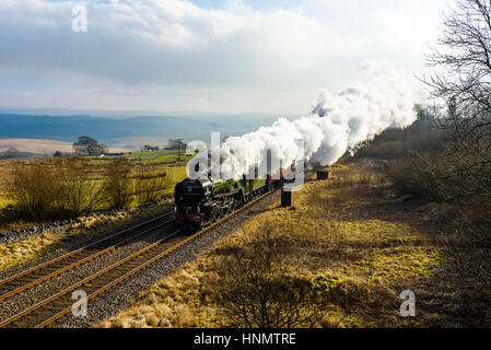 Ribblesdale, North Yorkshire, UK. 14th Feb, 2017. Steam locomotive Tornado hauls a train through Ribblesdale on the Settle-Carlisle line. This is the first day of steam-hauled scheduled services on the national rail network since 1968. Services continue on Wednesday and Thursday. The A1 Class Tornado 60163, completed in 2008, is the first main line steam engine to be built in the UK since the 1960s. Credit: Jon Sparks/Alamy Live News Stock Photo