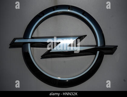 Ruesselsheim, Germany. 15th Feb, 2017. The sun is reflected in the logo of the car manufacturer Opel in Ruesselsheim, Germany, 15 February 2017. The head of parent company General Motors has travelled to Ruesselsheim for sales discussions around Opel. Photo: Andreas Arnold/dpa/Alamy Live News Stock Photo