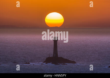 Lands End, Cornwall, UK. 15th Feb 2017. UK Weather. The sun sets over the longships lighthouse after another sunny day in Cornwall. Credit: Simon Maycock/Alamy Live News Stock Photo