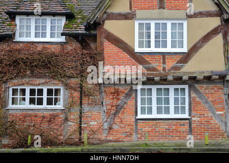 WINCHESTER, UK - FEBRUARY 5, 2017:  Exterior facade of a half timbered house on Kingsgate Street with colorful bricks Stock Photo
