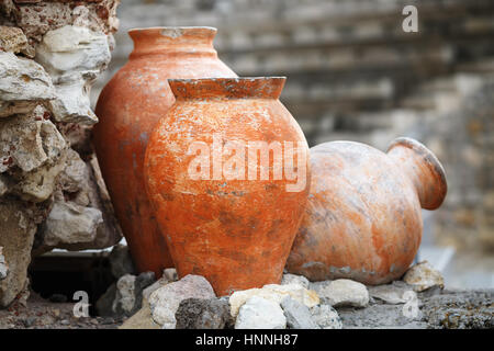 Old ancient clay vases outdoors. Still life of ceramic pots. Shallow depth of field. Selective focus. Stock Photo