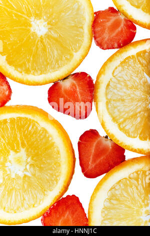 orange slices and strawberries isolated on white background. Stock Photo