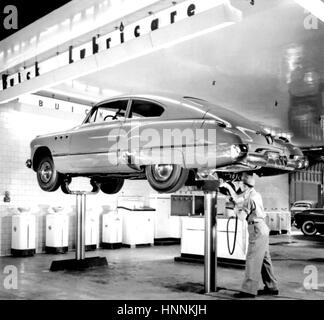 1949 BUICK SUPER SEDANET being lubricated. The model range was produced from 1940 to 1958. Photo: General Motors Stock Photo