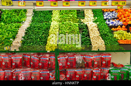 Variety of chillies on sale in produce counter of Arizona supermarket, USA Stock Photo