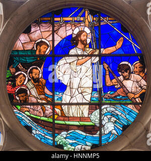 Jesus Calms the Storm, a stained glass on a window in Gustafs church, Copenhagen - February 11, 2014 Stock Photo