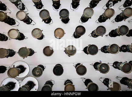 Bottom view of the old storm lanterns hang under the ceiling Stock Photo