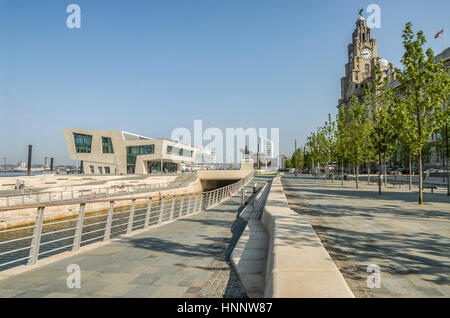 The new ferry terminal at Pier Head in Liverpool sits in front of the “Three Graces” on a UNESCO World Heritage Site. Stock Photo