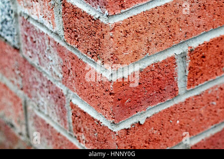 newly built corner red rustic brick wall in the uk Stock Photo