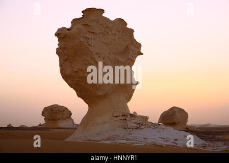 Sunrise and Sandstorn in egyptian White Desert next to oasis Baharia Stock Photo