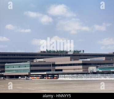 NARITA, JAPAN - CIRCA APR, 2013: Narita International Airport terminal 2 building. View from runway. Narita Airport is the predominant airport. It is  Stock Photo