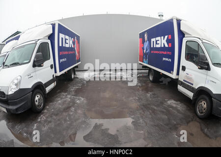 ST. PETERSBURG, RUSSIA - CIRCA JAN, 2016: Wide angle view of light lorries parking lot. Russian transportation company PEC (First expedition company)  Stock Photo