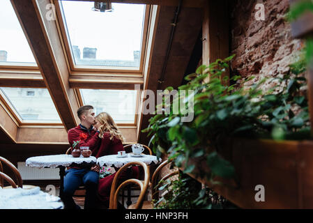 Beautiful young man and woman are celebrating Valentine day Stock Photo