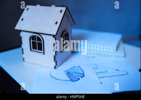 Toy wooden house. Concept Stock Photo