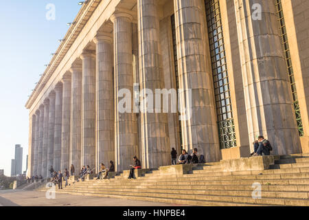 Students sitting on the steps of the University of Buenos Aires, Argentina Stock Photo