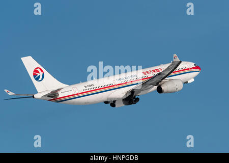 China Eastern Airlines plane airplane Airbus A330 (A330-200) wide-body jet airliner jetliner airborne Stock Photo