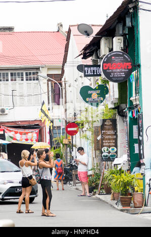 Love Lane scene with tourists, Georgetown, Penang, Malaysia Stock Photo