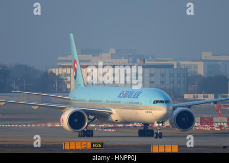 Korean Air Boeing 777-3B5ER HL8208 taxiing in after arrival at London Heathrow Airport Stock Photo
