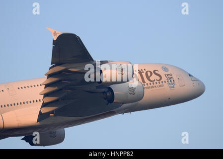 Emirates Airbus A380-861 A6-EEA taking off from London Heathrow Airport in blue sky Stock Photo