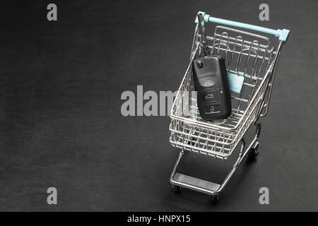 Car keys in a shopping cart Stock Photo