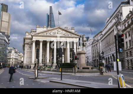 London, England - The Royal Echnage building with walking business man Stock Photo