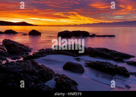 Sunrise at Aylard Farm beach-East Sooke Park, British Columbia, Canada. Stock Photo