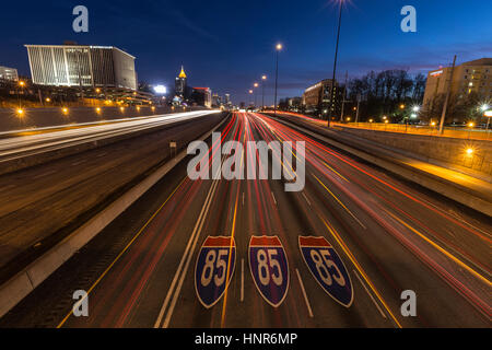 ATLANTA GEORGIA - FEBRUARY 16, 2014:  Fast traffic on Atlanta's Interstate 85 freeway at night. Stock Photo