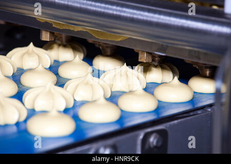 Biscuit depositing machine Stock Photo