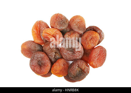 Close up picture of dried organic apricots isolated on white background. Stock Photo
