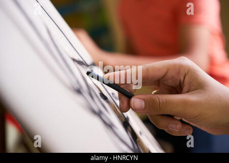 School of art, college of arts, education for group of young students. Man sketching for fun, student drawing for hobby. Close up of hand Stock Photo