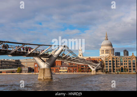 The millenium bridge across the river Thames in london from the Tate modern art gallery towards Saint pauls cathedral. Stock Photo