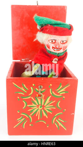 Scary, creepy jack-in-the-box toy. Isolated. Vertical. Stock Photo