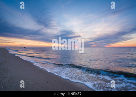 Sunset over the Delaware Bay, at Sunset Beach in Cape May, New Jersey. Stock Photo