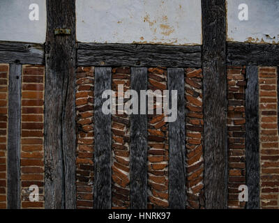 Old Wall in Winchester, England. Bricks with wooden support frame. Stock Photo