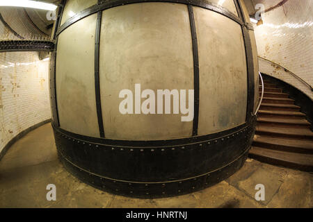 Helical staircase and lift in the entrance shaft leading down to Greenwich Foot Tunnel, London, UK Stock Photo