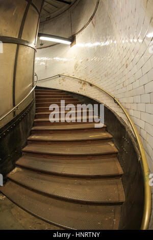 Helical staircase and lift in the entrance shaft leading down to Greenwich Foot Tunnel, London, UK Stock Photo