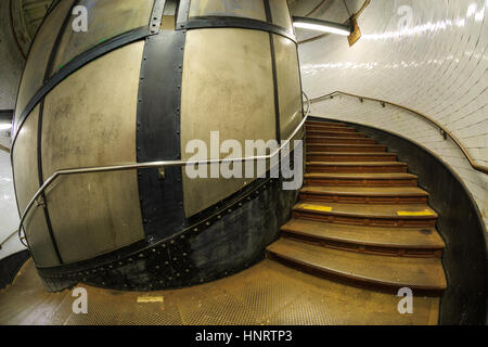 Helical staircase and lift in the entrance shaft leading down to Greenwich Foot Tunnel, London, UK Stock Photo