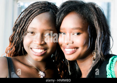 Two young African women in studio setting Stock Photo