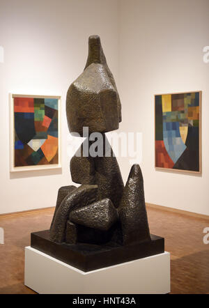 Cologne, Germany. 16th Feb, 2017. L-R: The painting 'Composition' (1932), the bronze sculpture 'Ascent' (1929/1960) and the painting 'Composition' (1930) by Otto Freundlich on display as part of the Ludwig Museum's 'Otto Freundlich: Cosmic Communism' show in Cologne, Germany, 16 February 2017. Photo: Henning Kaiser/dpa/Alamy Live News Stock Photo