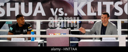 Cologne, Germany. 16th Feb, 2017. Wladimir Klitschko (r) and Anthony Joshua, photographed during a press conference in Cologne, Germany, 16 February 2017. Wladimir Klitschko and world champion Anthony Joshua will fight for the IBF title on 29 April 2017 in London, England. Photo: Roland Weihrauch/dpa/Alamy Live News Stock Photo