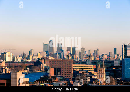 Sunset over financial district cityscape of London, including Canary Wharf Stock Photo