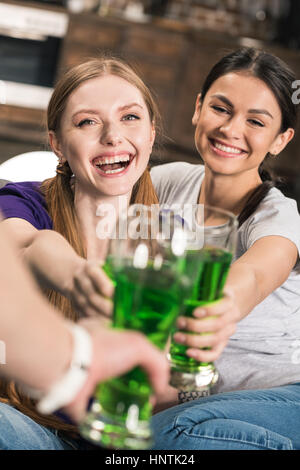 Happy young women celebrating St Patricks Day Stock Photo