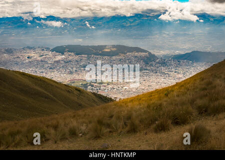 The TelefériQo in Quito, Ecuador, running from the edge of the city up the east side of Pichincha Volcano.View from the top looking at Cruz Loma Stock Photo