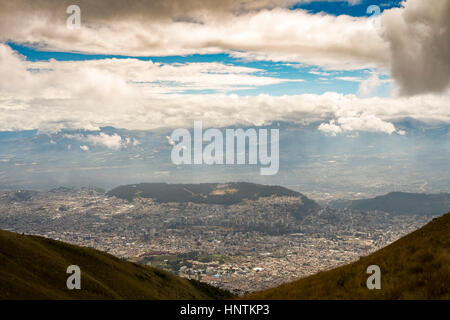 The TelefériQo in Quito, Ecuador, running from the edge of the city up the east side of Pichincha Volcano.View from the top looking at Cruz Loma Stock Photo