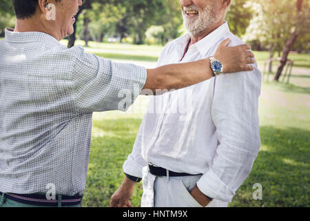 Senior Friends Retirement Talking Laughing Concept Stock Photo
