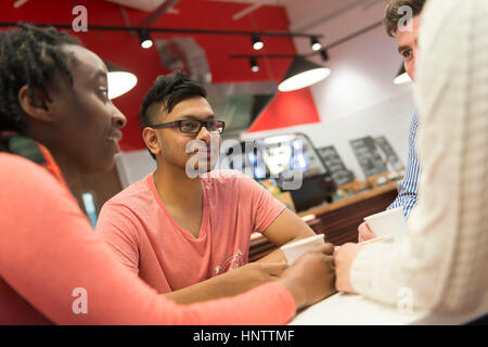 Friends in a coffee shop Stock Photo