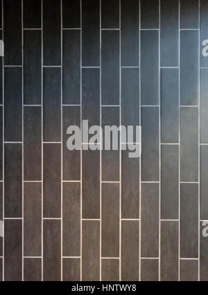 Gradient of Light Over Long Gray Tiles Vertical Background Stock Photo