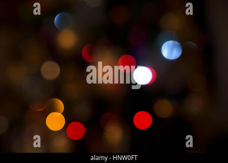 abstruct unfocused red orange blue green and yellow circle lights Stock Photo