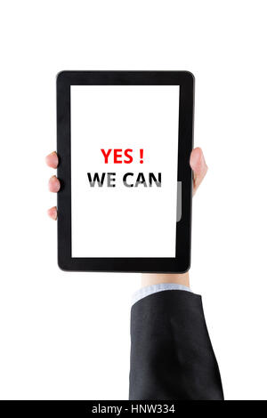 hand of businessman holding digital tablet with word yes we can isolated on white background with clipping path Stock Photo