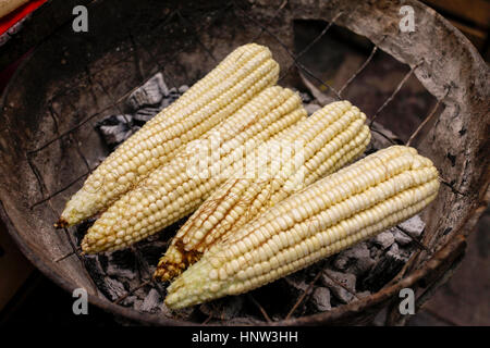 Corn cobs on grille Stock Photo