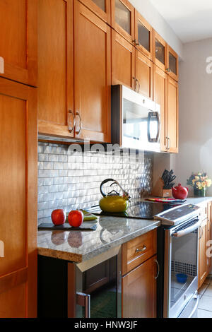 Stove and cabinets in modern kitchen Stock Photo